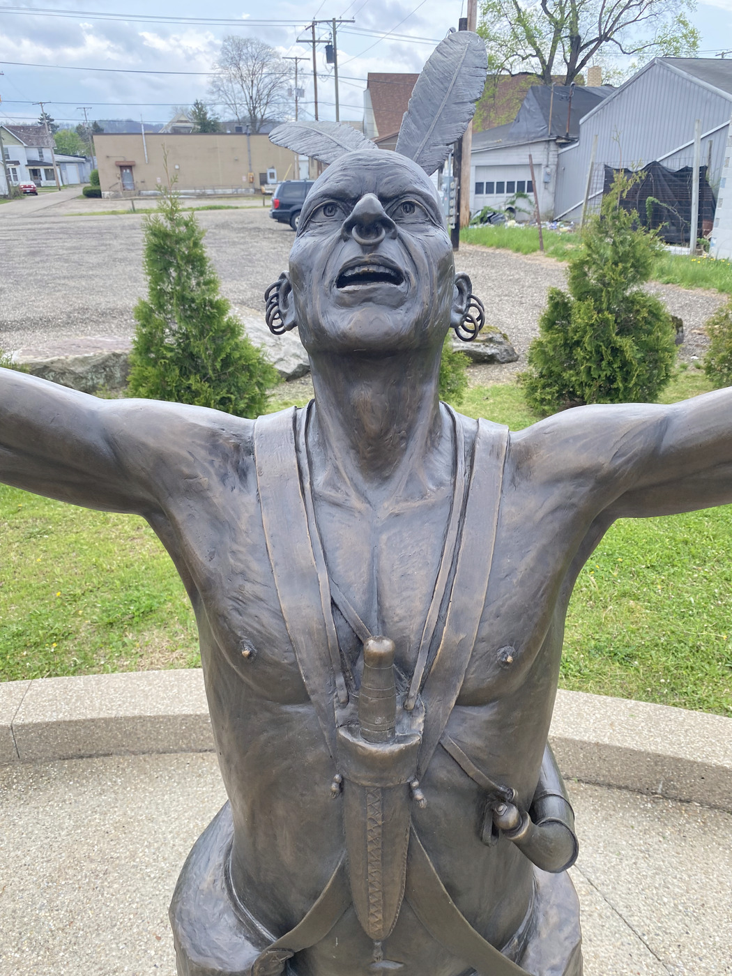 Bronze statue detail honoring the village's founders