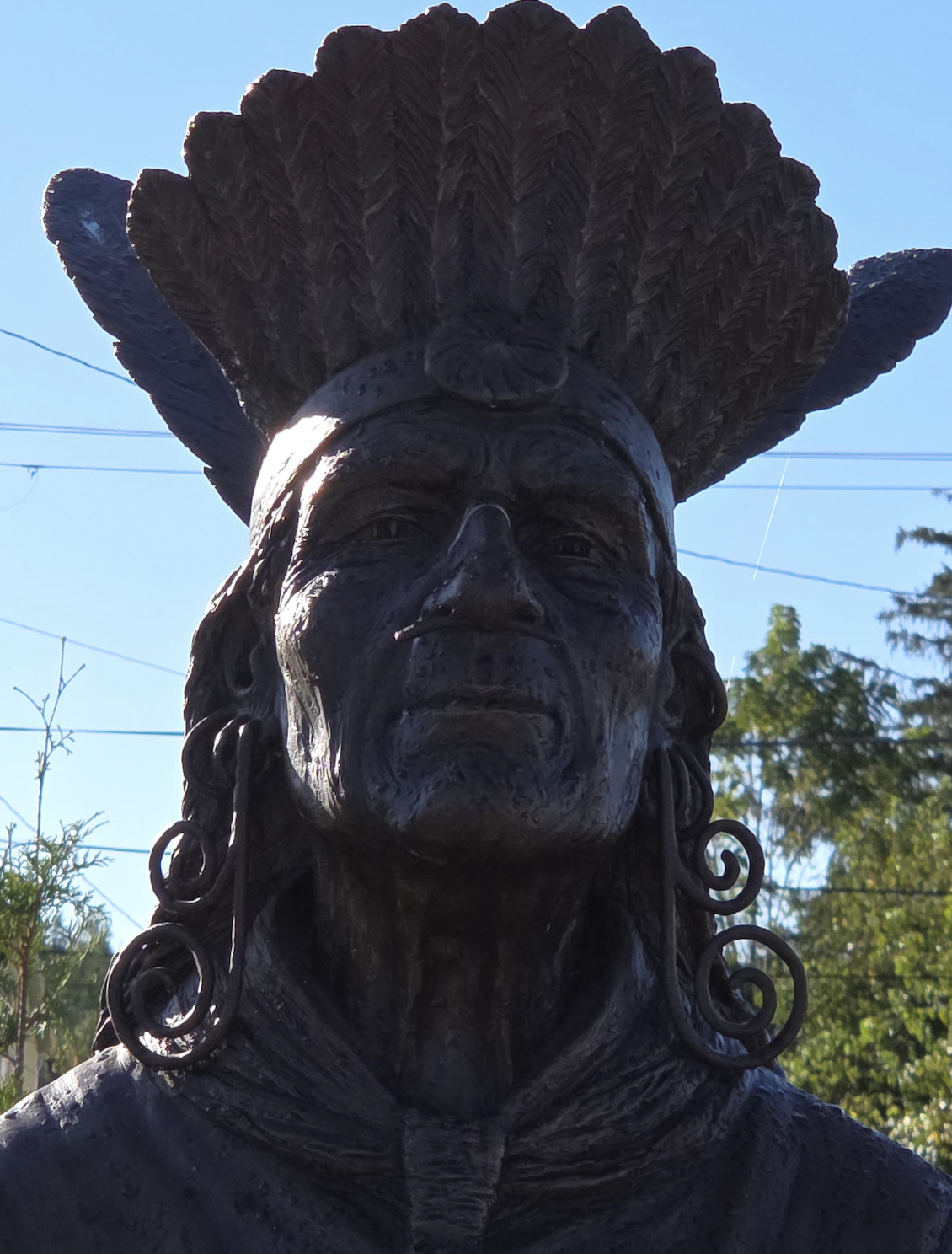 Close-up of the Chief Netawatwees statue's face and headdress